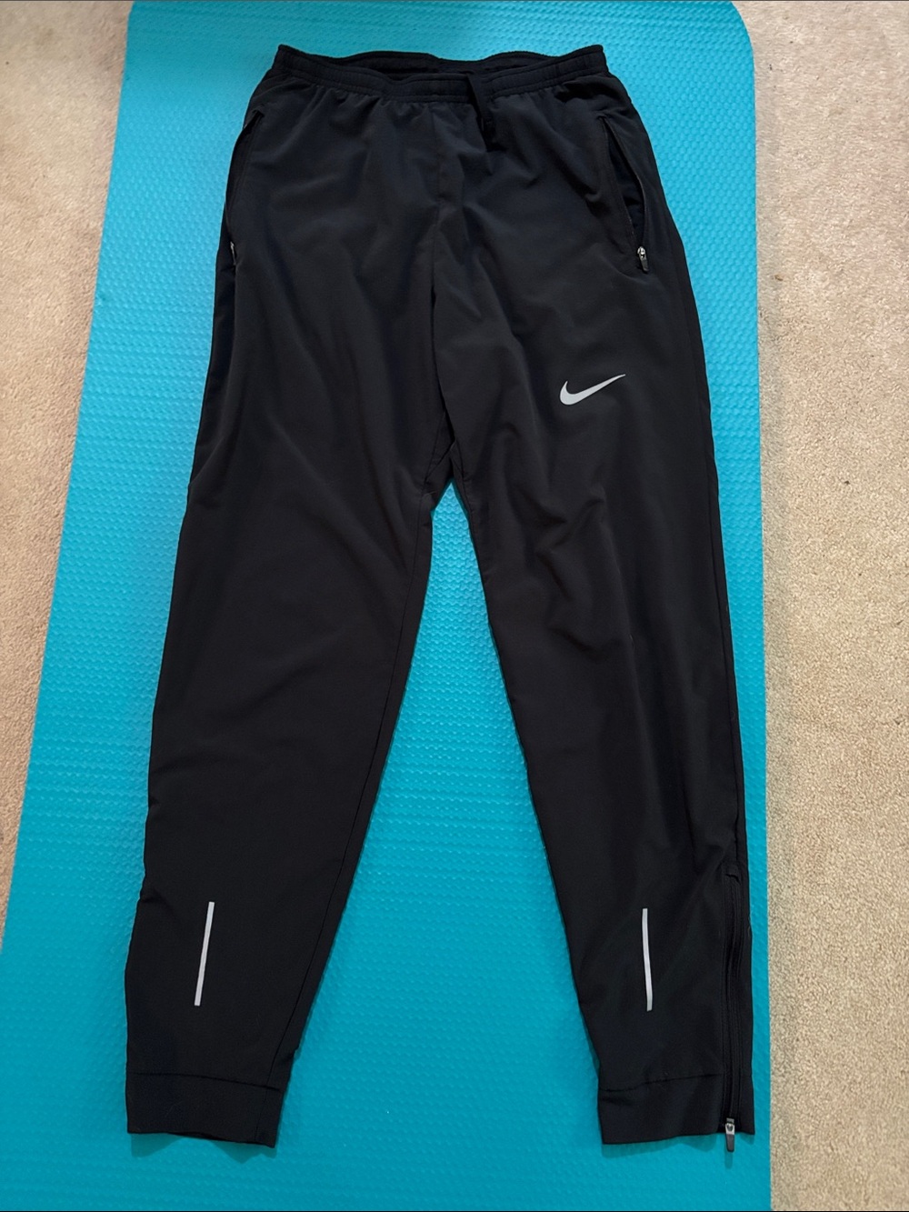 Nike Black Track Pants with White Swoosh and Reflective Accents